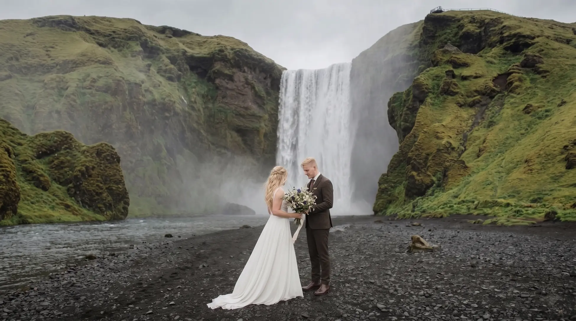 Destination wedding in Iceland -- Aurora Borealis glacial lagoon Jokulsarlon and volcanic black sand elopement